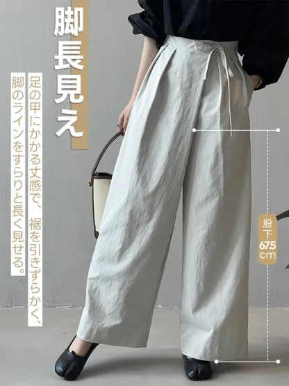 「身長153cm以上向け」アシンメトリー斜め前立てウエストリボン付きカジュアルなワイドパンツ