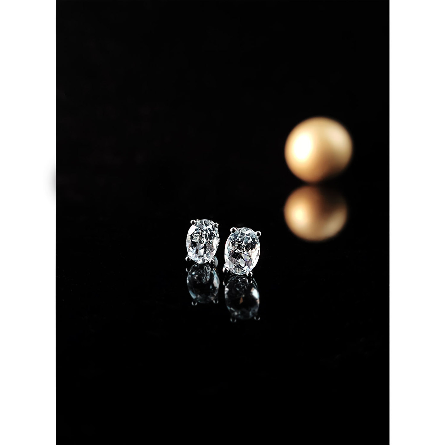 Clear Quartz Oval with Four Claws Earrings