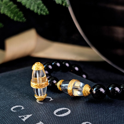 28 janClear Quartz Charm