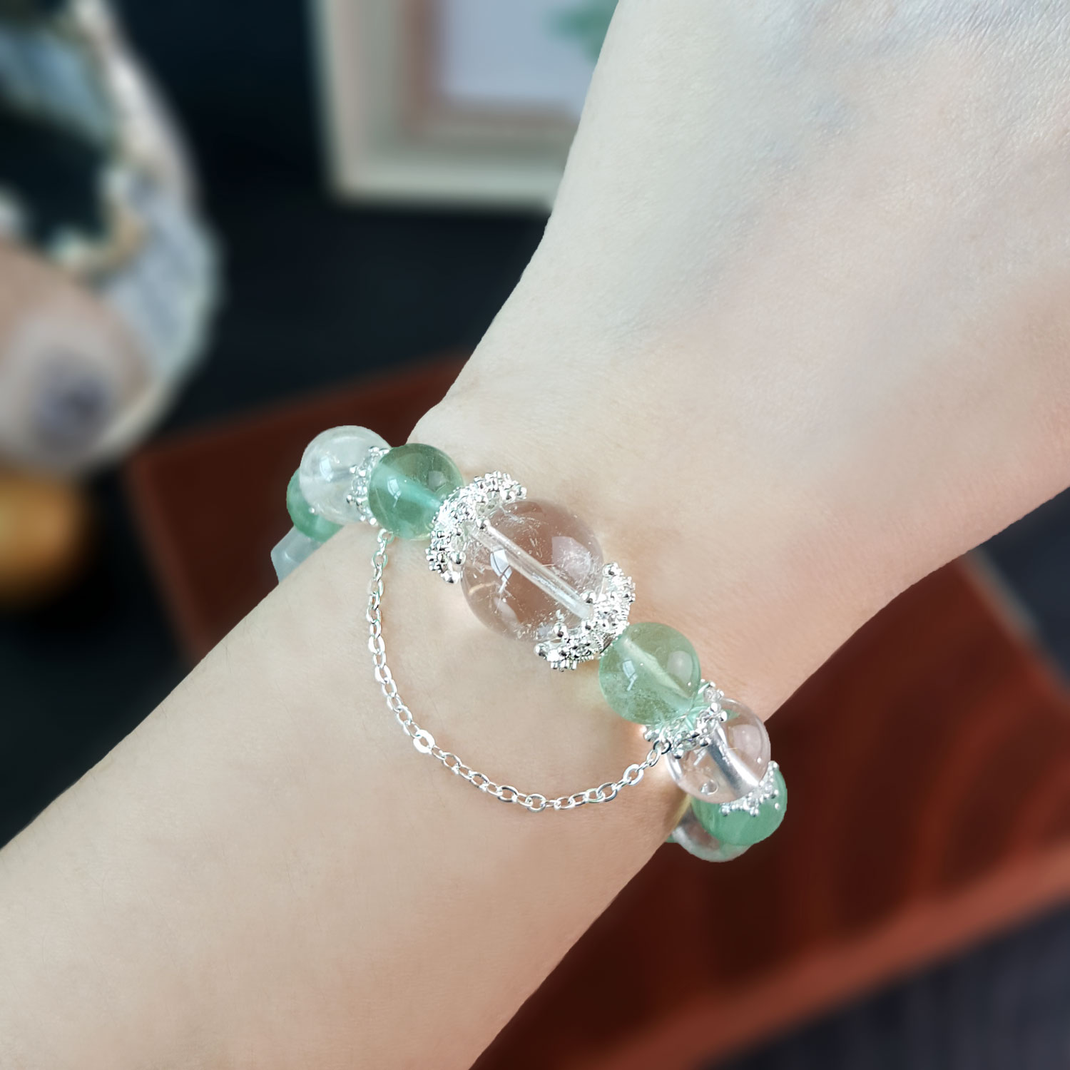 17 Aug - 10mm Green Fluorite And Clear Quartz Design Bracelet