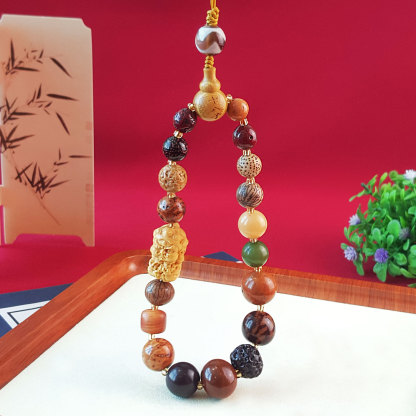 4 Aug - Eighteen Seed Bodhi with Jambhala Design Phone Hanger