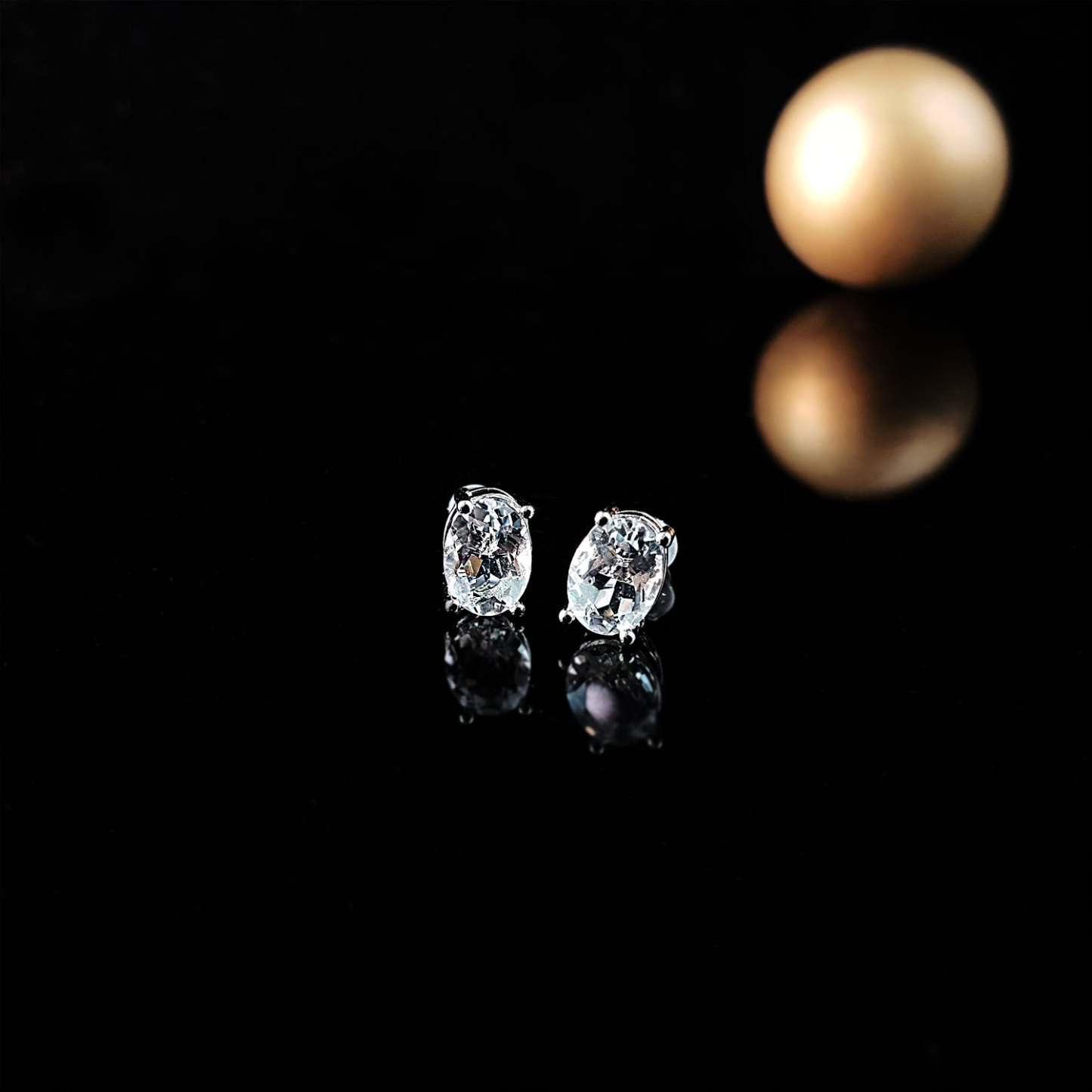 Clear Quartz Oval with Four Claws Earrings