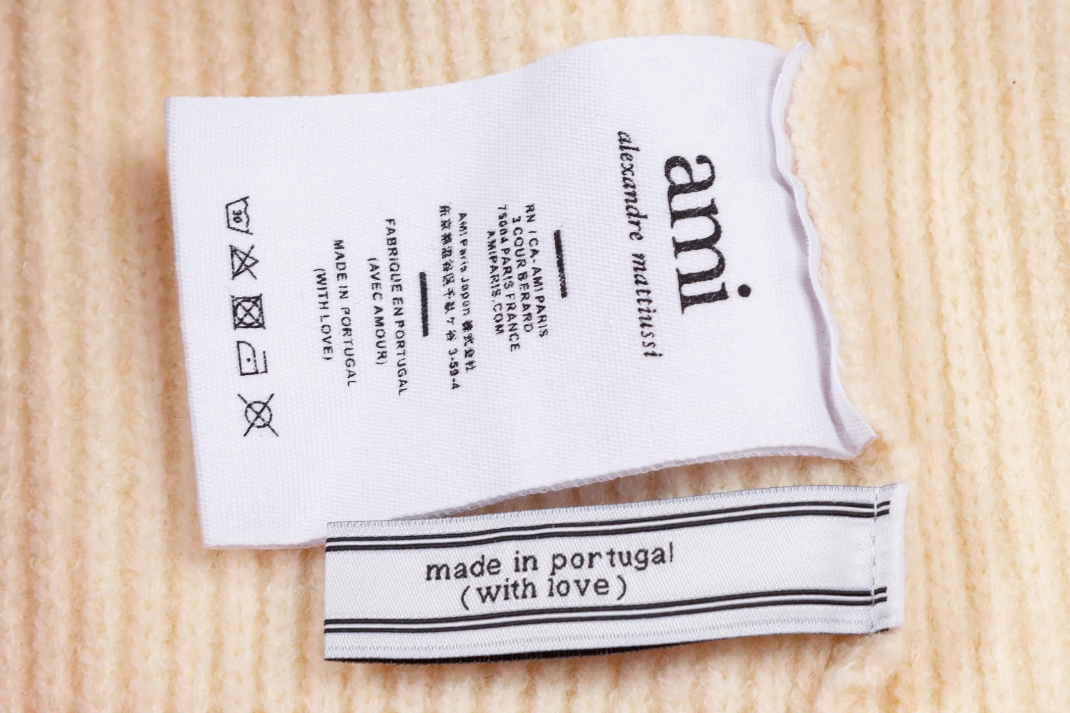 AMI PARIS（アミ パリス） オーバーサイズ ウール カーディガン 男女兼用ロゴニット