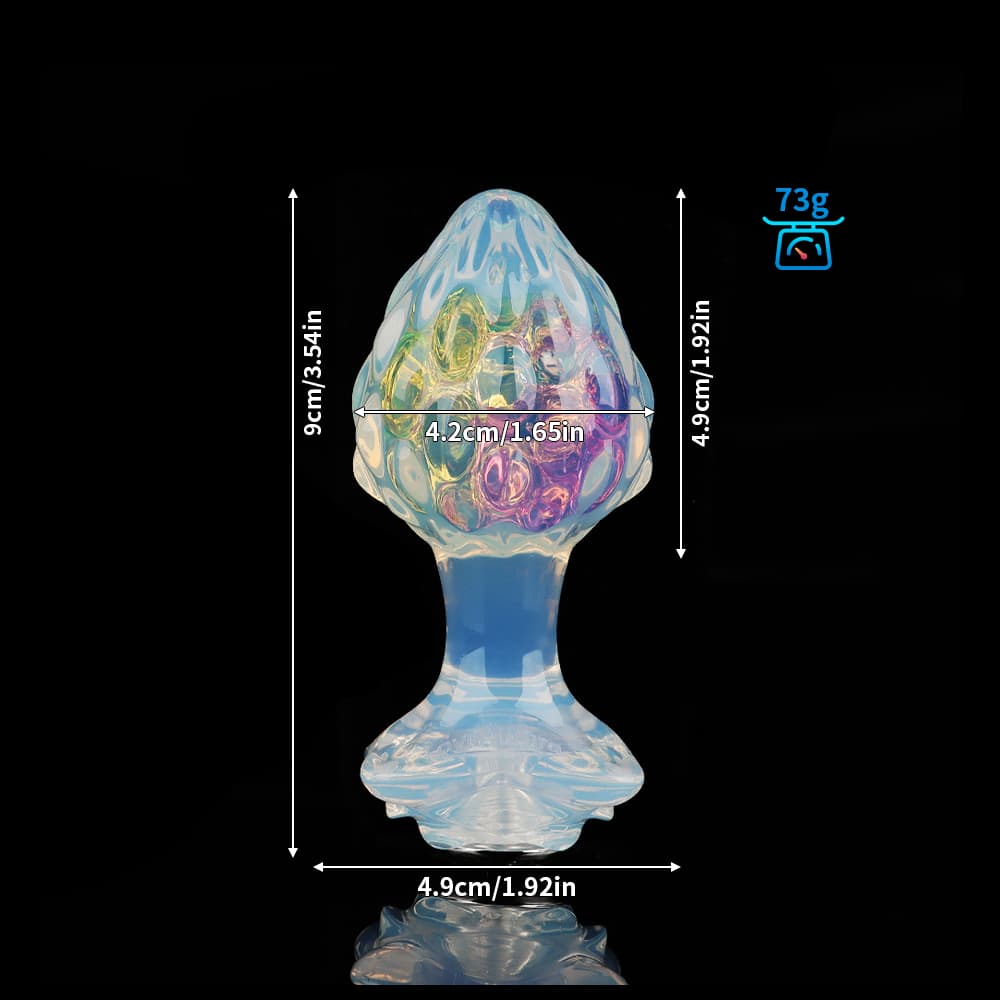 4 種の付属品により ハーフクリアで、内部には虹色の輝きを放つ「薔薇」イメージの水晶アナルプラグ。4 種の付属品により