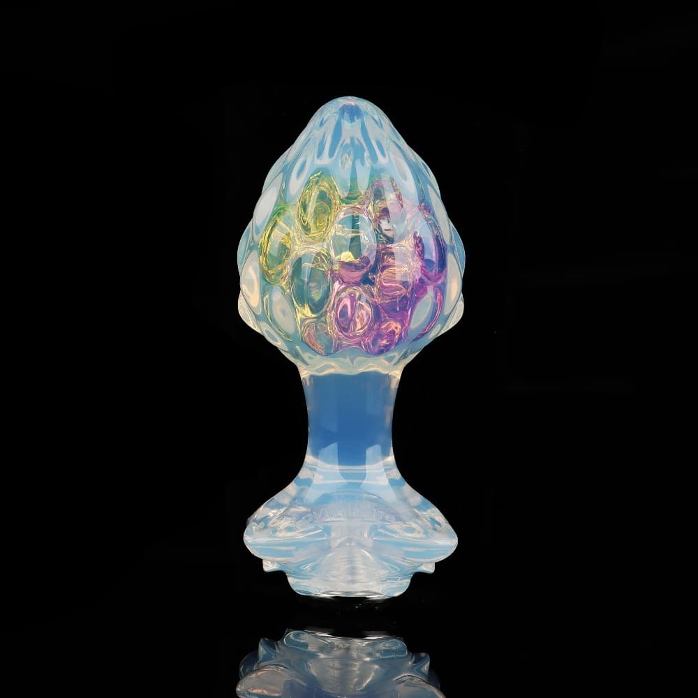 4 種の付属品により ハーフクリアで、内部には虹色の輝きを放つ「薔薇」イメージの水晶アナルプラグ。4 種の付属品により