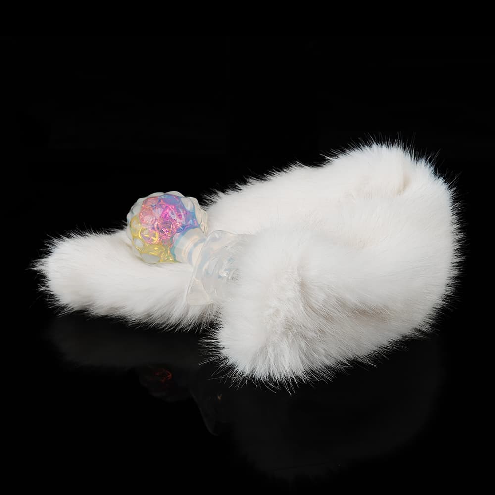 4 種の付属品により ハーフクリアで、内部には虹色の輝きを放つ「薔薇」イメージの水晶アナルプラグ。4 種の付属品により