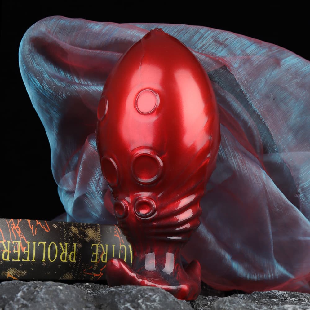 濃厚なカーニアンレッドを纏うインフレータブルアナルプラグ