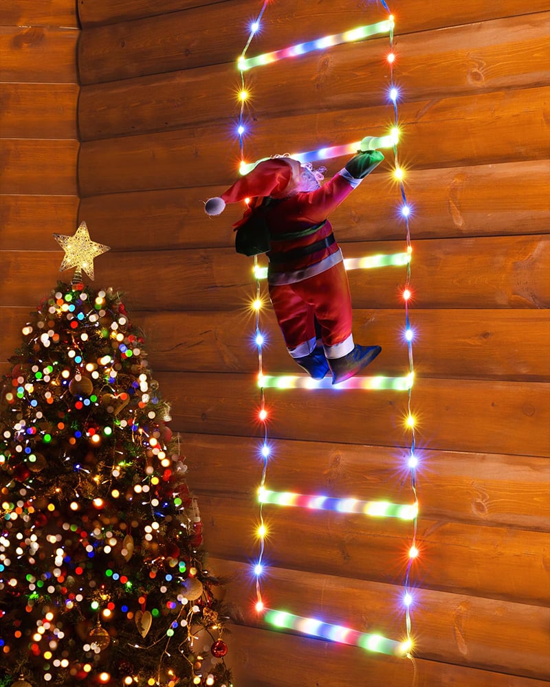 Santa Claus climbing stairs decorates