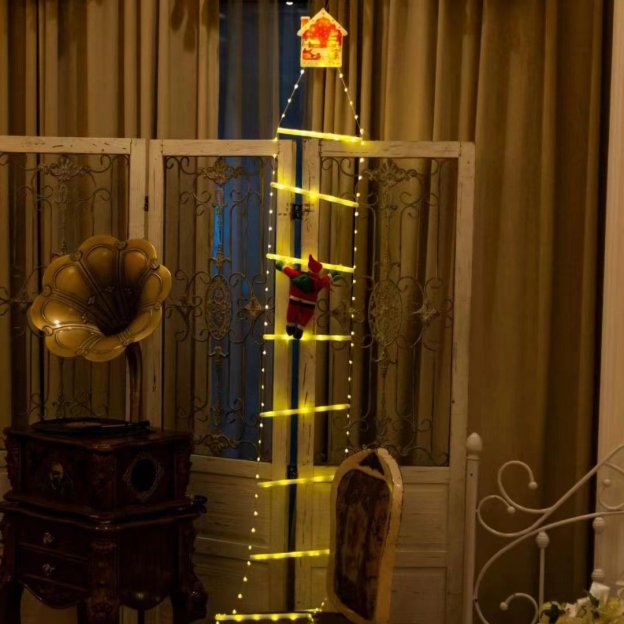 Santa Claus climbing stairs decorates