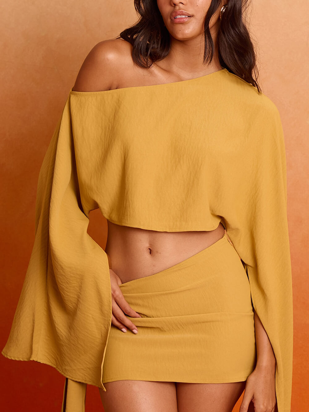 Flowy Asymmetrical Off-Shoulder Flared Sleeve Crop Top