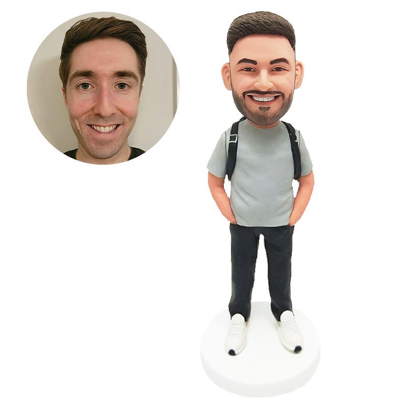 customised bobble head casual man carry a backpack