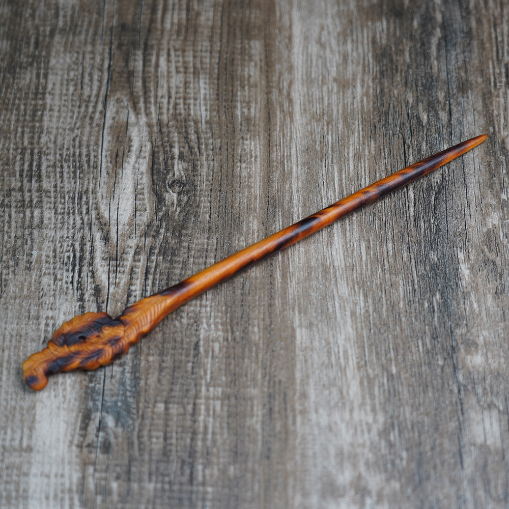 Lightning-struck peach wood hairpin with phoenix tail, exquisitely carved, a Taoist item