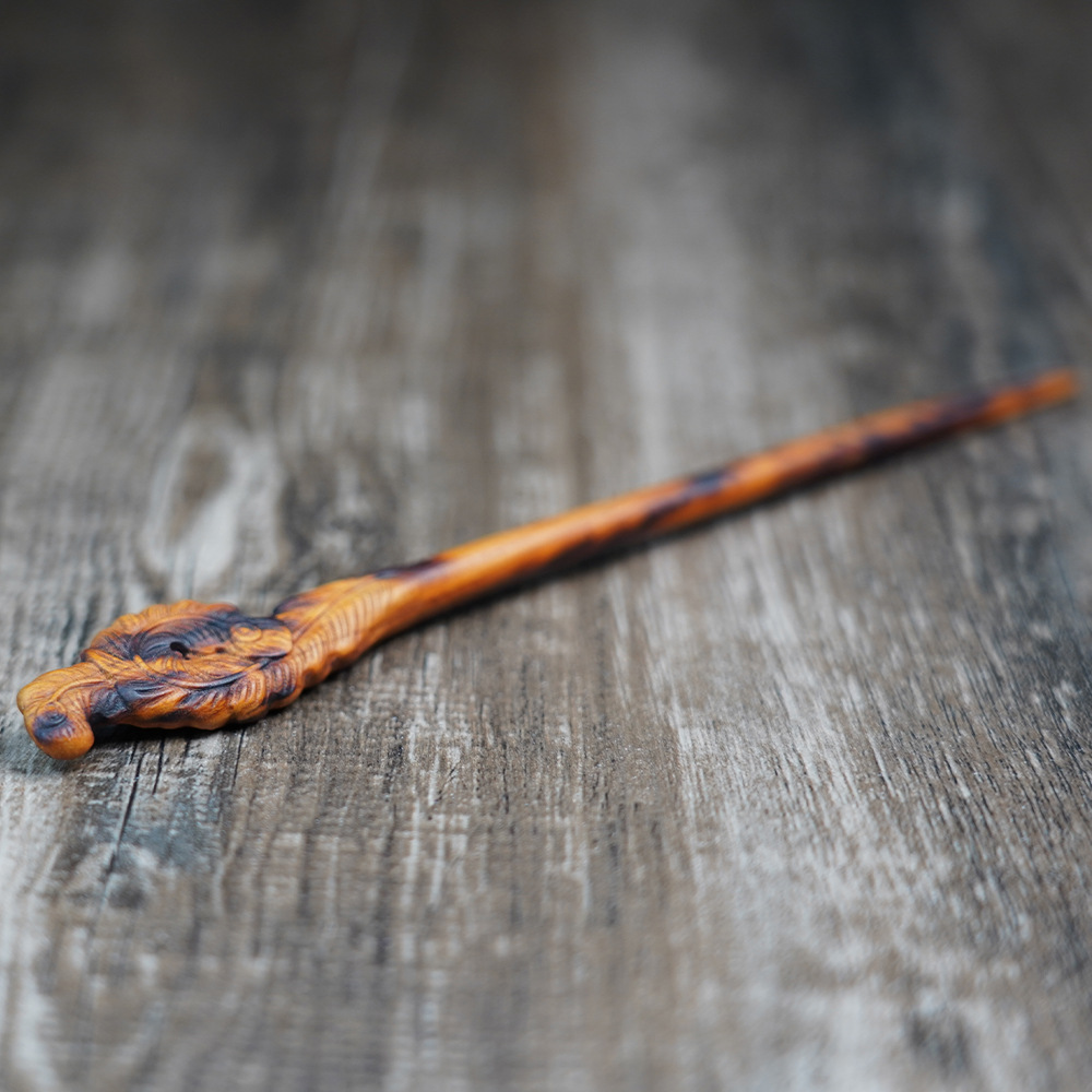 Lightning-struck peach wood hairpin with phoenix tail, exquisitely carved, a Taoist item