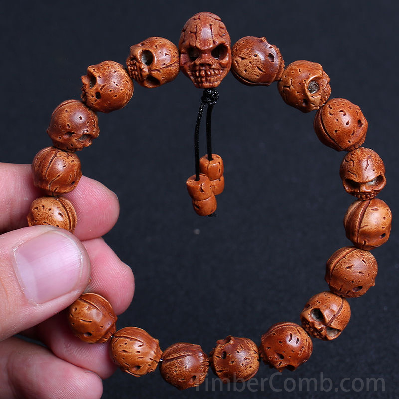 特選腕輪念珠 木玉ブレス 骸骨彫り(髑髏彫り) 桃の核 12mm玉 内周約