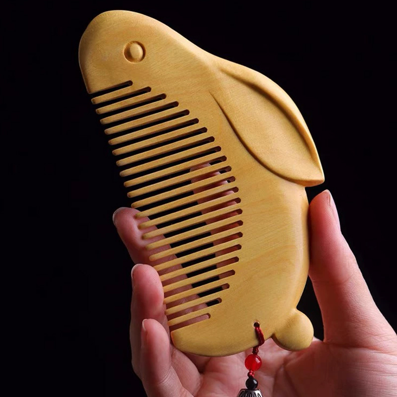 つげ櫛 彫刻 櫛 可愛らしい両面うさぎの形 椿油コーティング加工 静電気防止 携帯便利