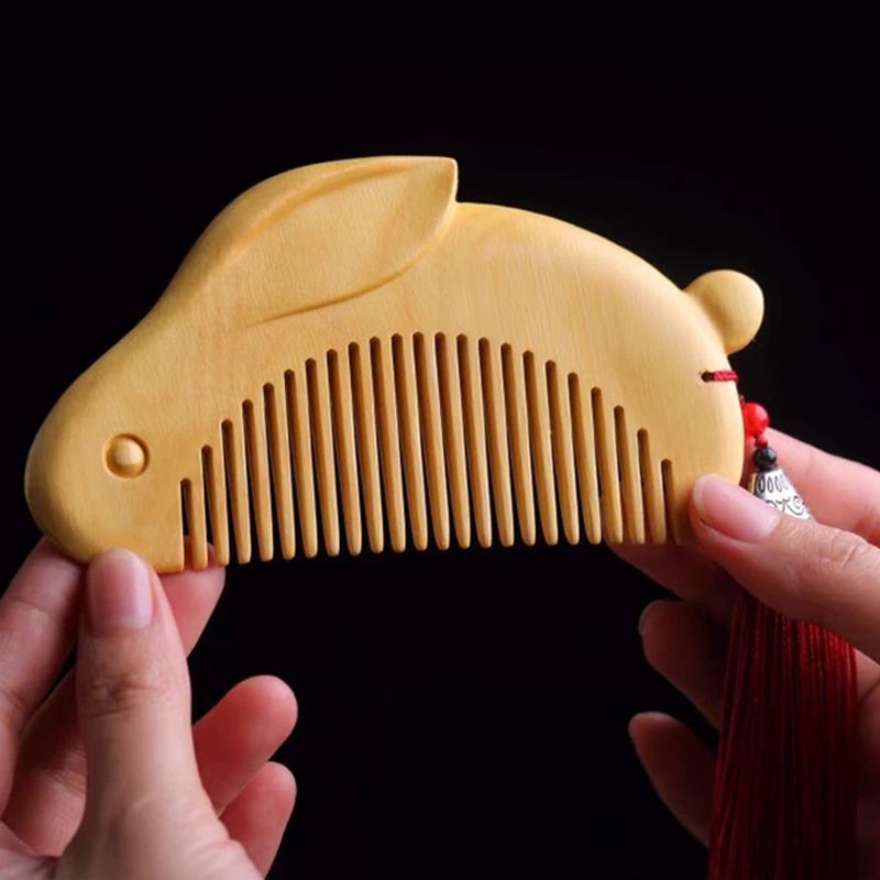 つげ櫛 彫刻 櫛 可愛らしい両面うさぎの形 椿油コーティング加工 静電気防止 携帯便利