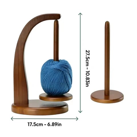 Two Levitating Premium Yarn Holders made from eco-friendly wood are shown—one with a blue ball of tangle-free yarn, the other empty. Each holder measures 27.5 cm tall and 17.5 cm wide. Two Levitating Premium Yarn Holders made from eco-friendly wood are shown—one with a blue ball of tangle-free yarn, the other empty. Each holder measures 27.5 cm tall and 17.5 cm wide.