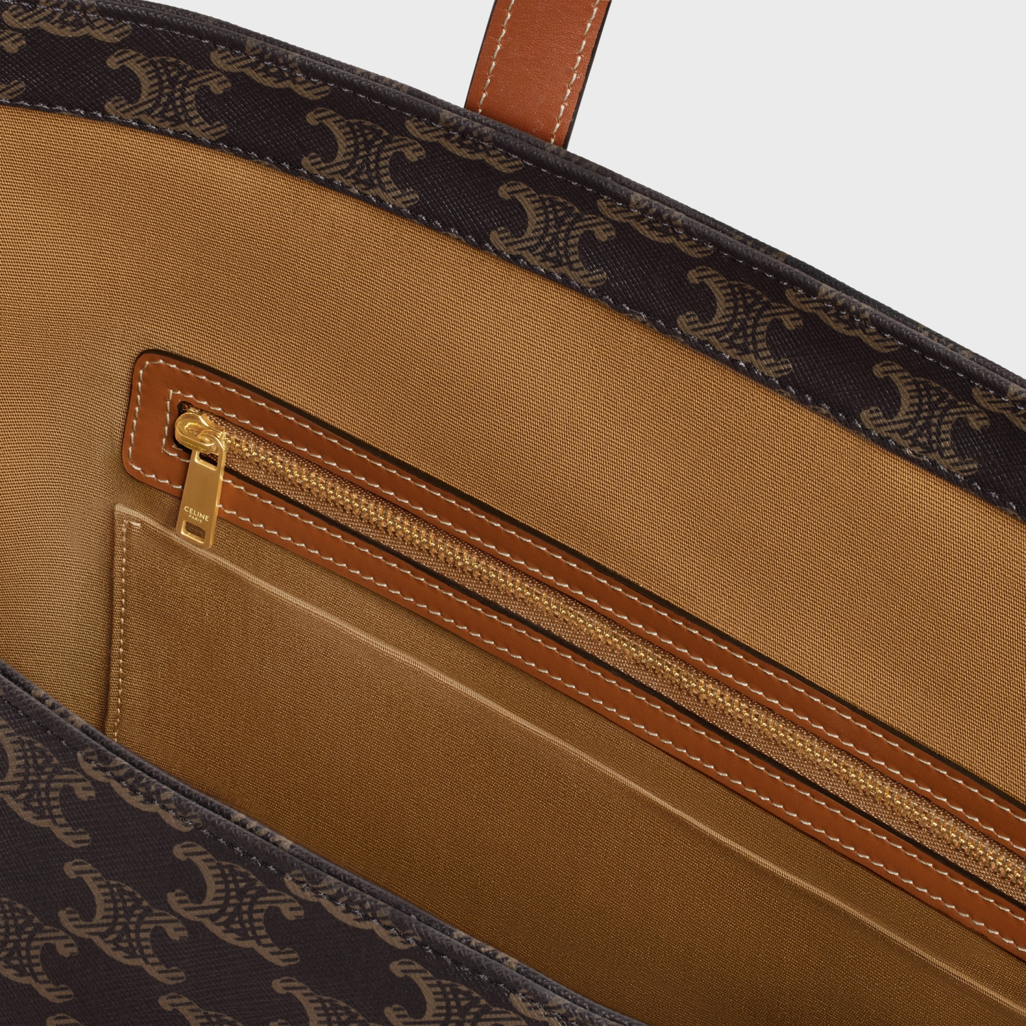 CABAS DRAWSTRING IN TRIOMPHE CANVAS AND CALFSKIN TAN