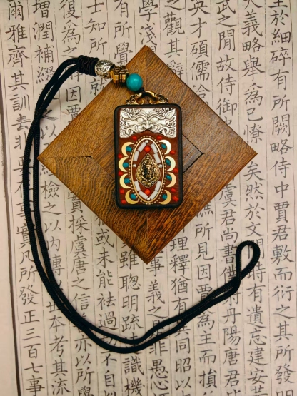 タンカ平安牌ゾウモチーフネックレス