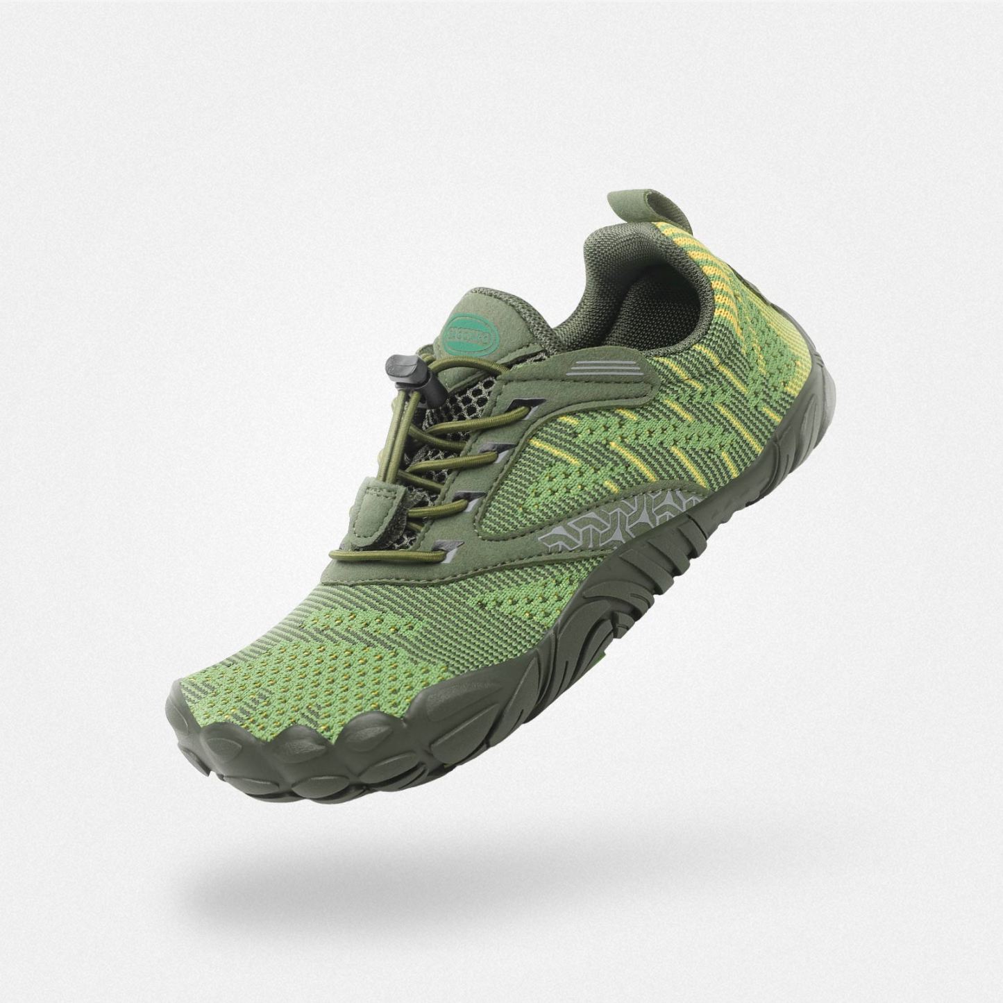 フリーⅠ キッズ ベアフットシューズ（インクグリーン）。森の中の探検や軽いハイキングにもぴったりな、自然に馴染む丈夫な靴。