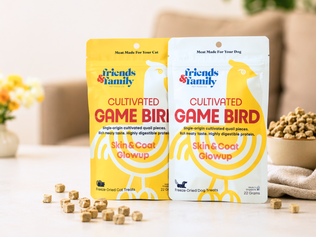 Cultivated-pet-treats-packaging-with-scattered-treats-on-table
