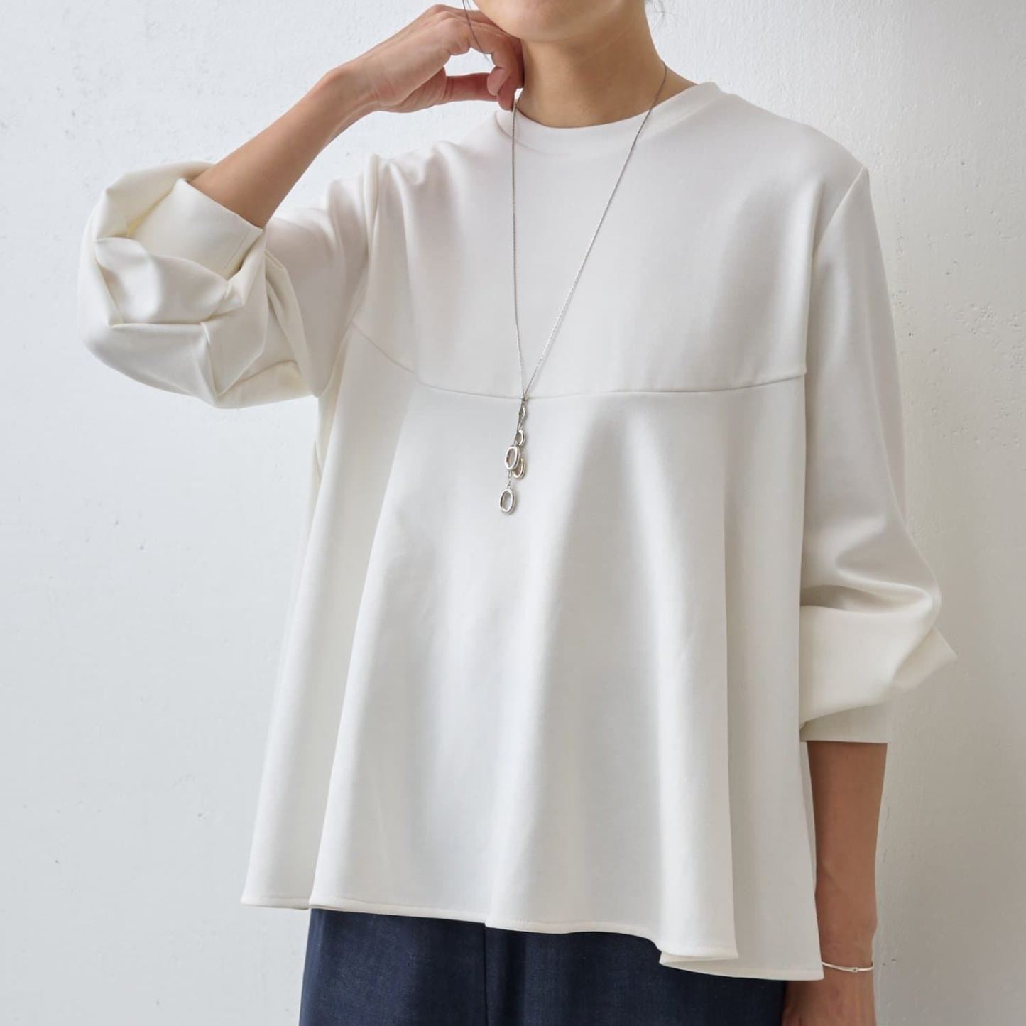 フレアヘムの長袖カットソー