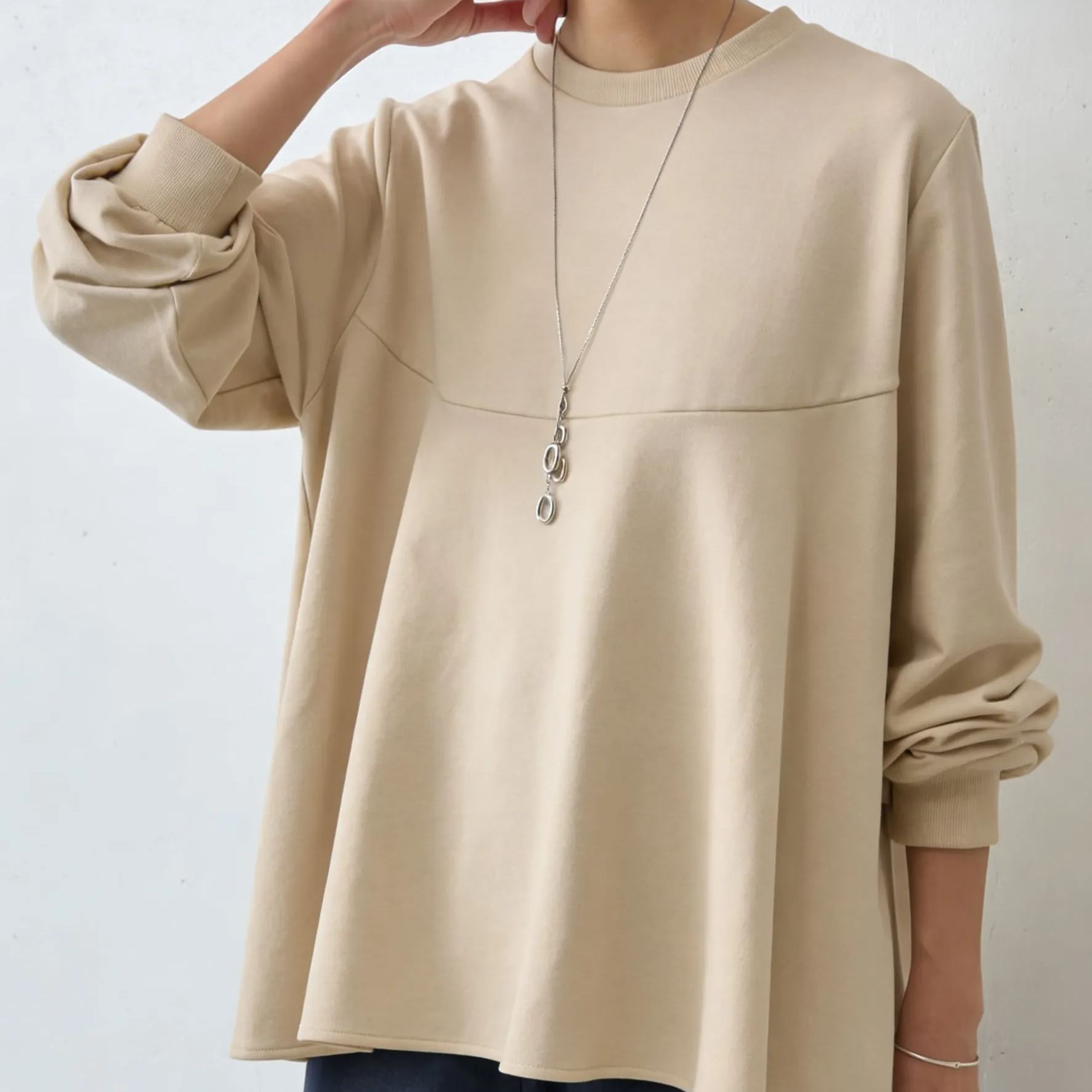 フレアヘムの長袖カットソー