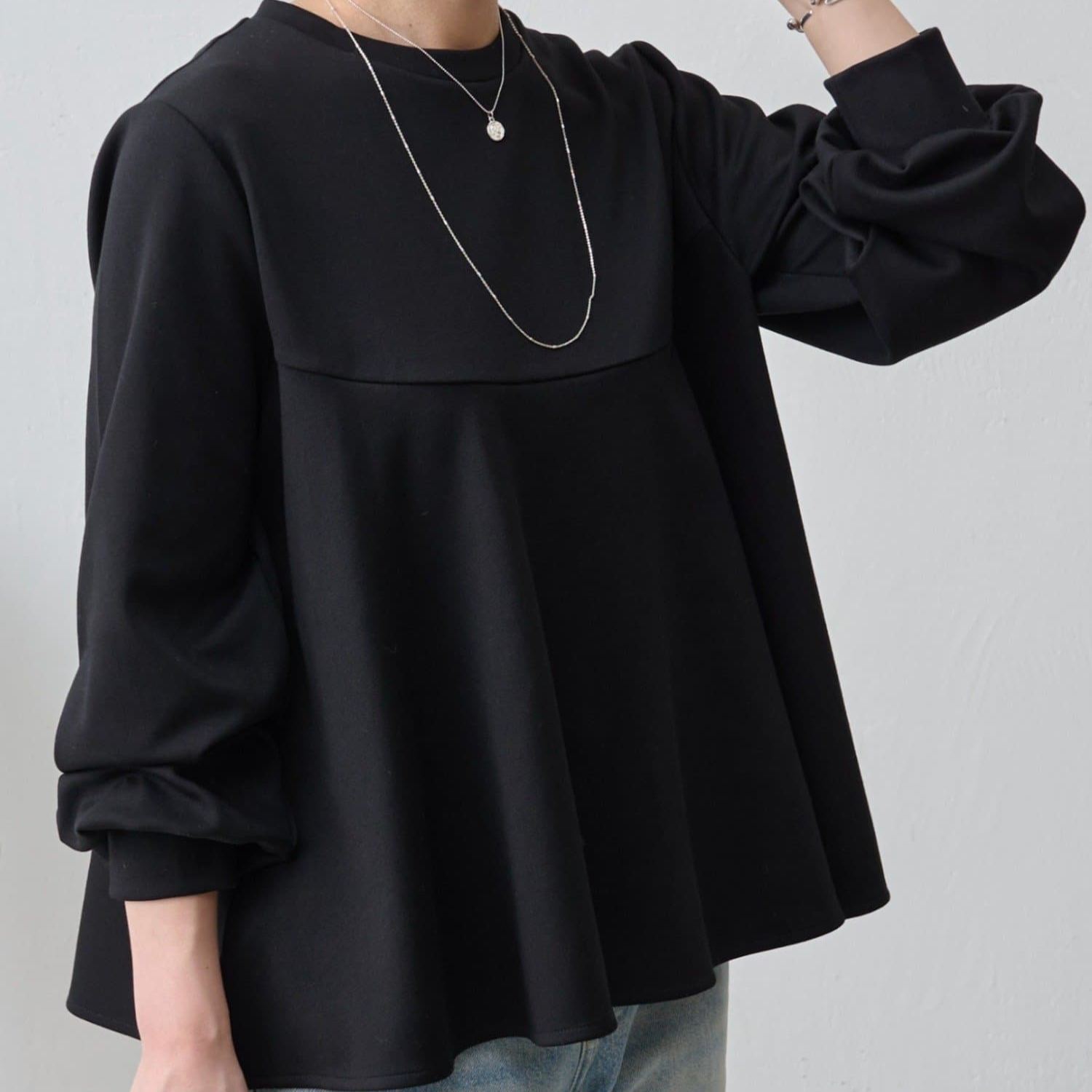 フレアヘムの長袖カットソー