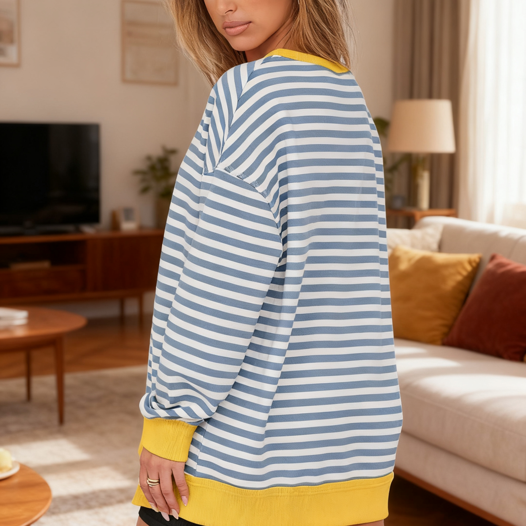 Close-up of V-neck and stripe pattern on sweatshirt