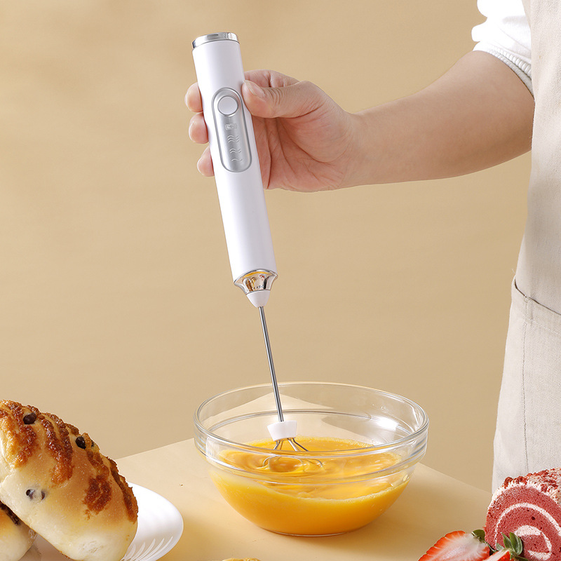 Small handheld electric egg beater