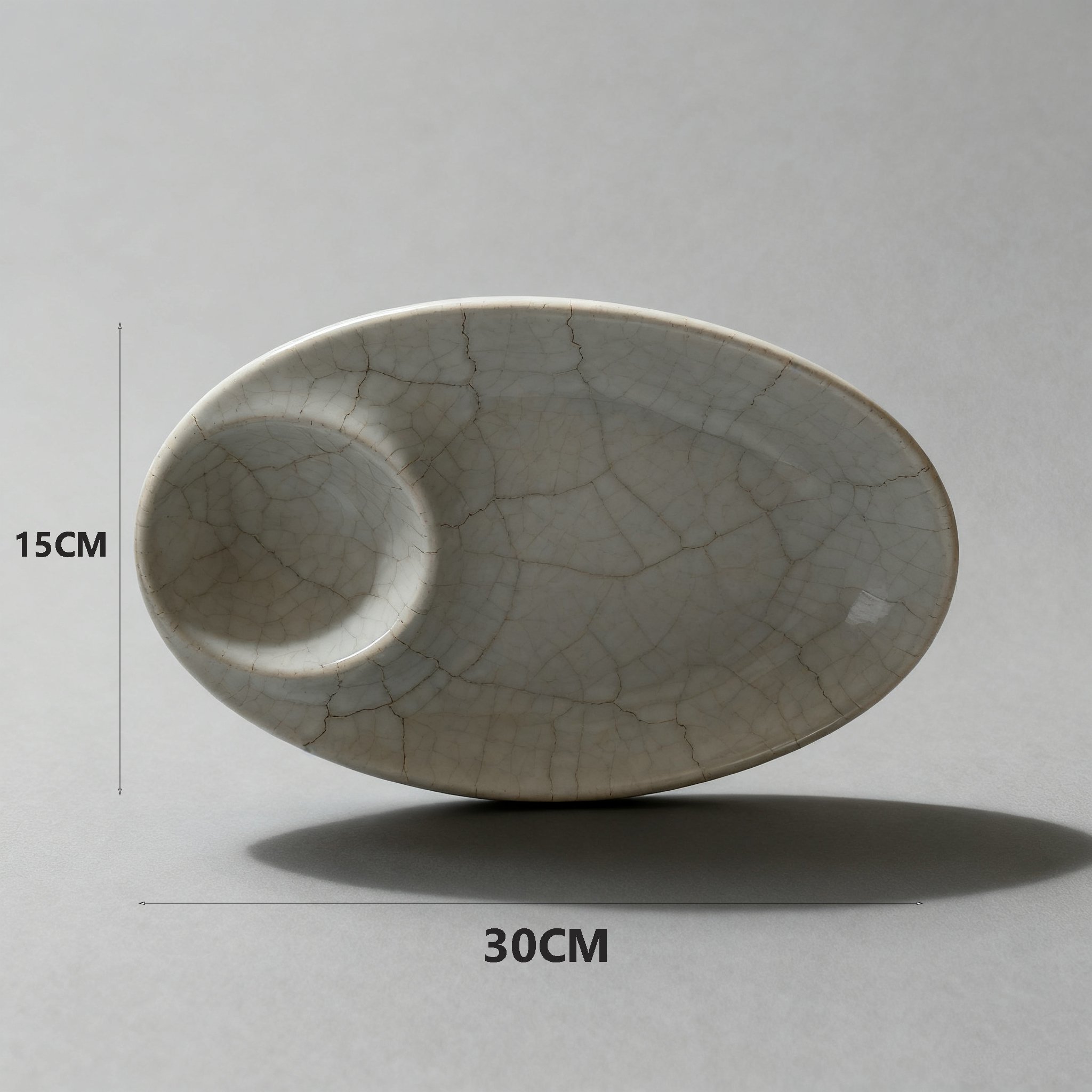 จานเซรามิกสีขาววงรี