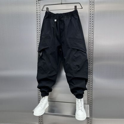 薄款潮流速乾束腳九分痞帥休閒哈倫褲