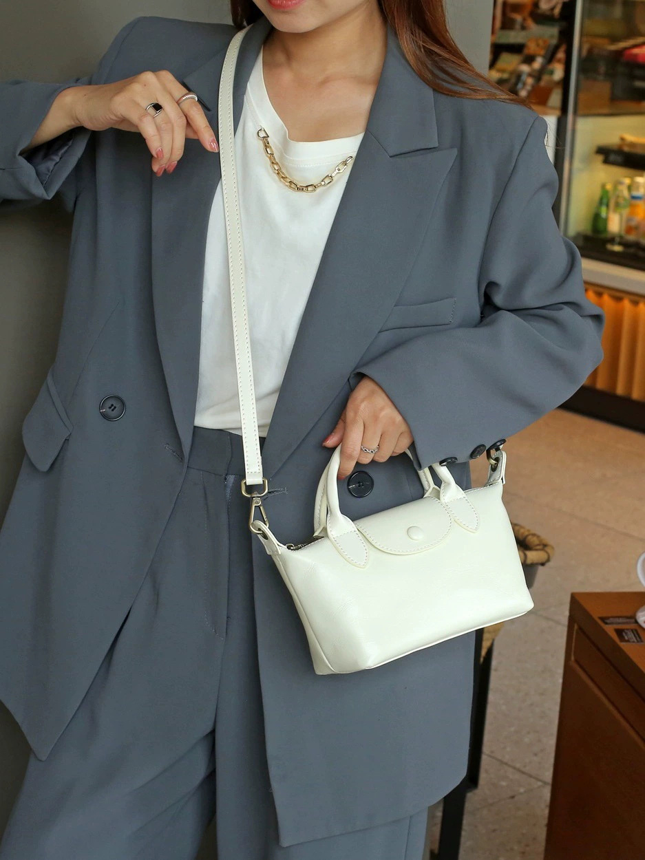 DEEPKEE 頭層植鞣牛皮餃子包 復古百搭女包 斜挎小包 77158 號