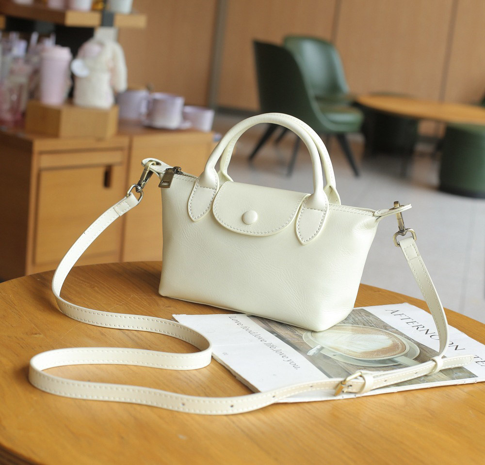 DEEPKEE 頭層植鞣牛皮餃子包 復古百搭女包 斜挎小包 77158 號