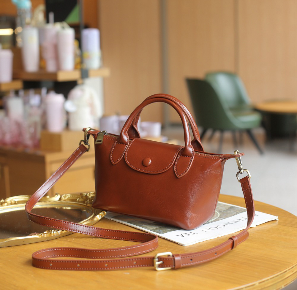 DEEPKEE 頭層植鞣牛皮餃子包 復古百搭女包 斜挎小包 77158 號