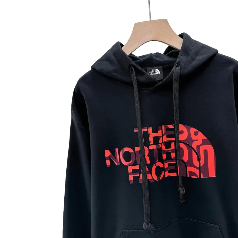 The North Face ザ・ノース・フェイスフロントに大きなロゴプリントが入った、カップル向けテリーフード付きスウェットシャツ