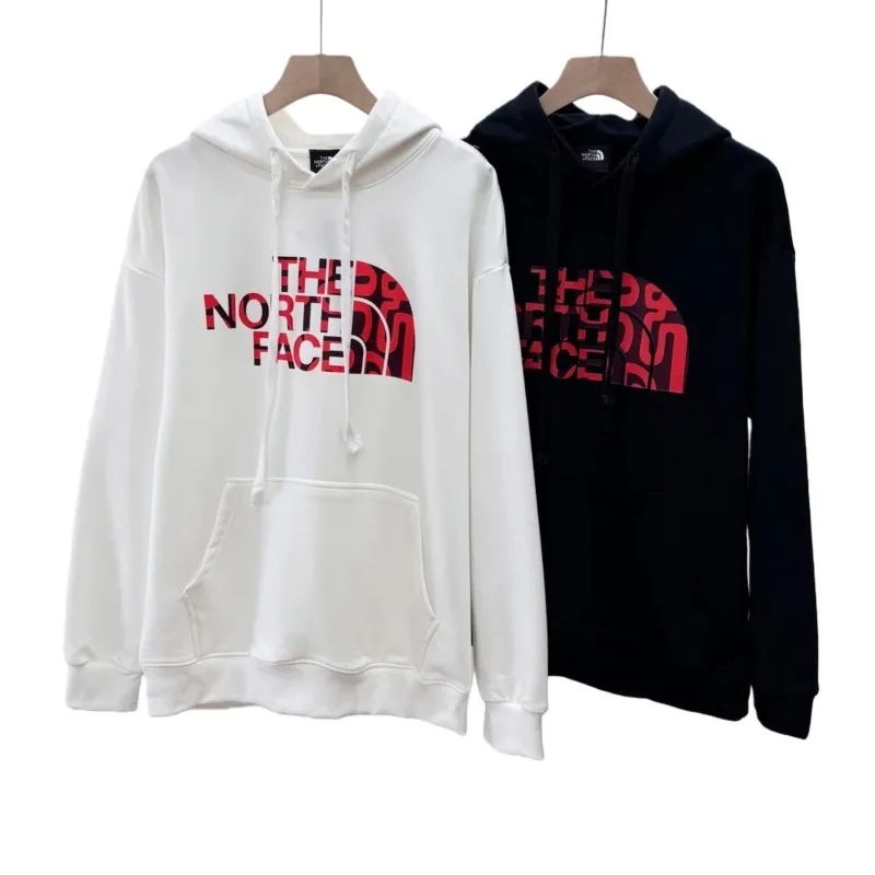 The North Face ザ・ノース・フェイスフロントに大きなロゴプリントが入った、カップル向けテリーフード付きスウェットシャツ