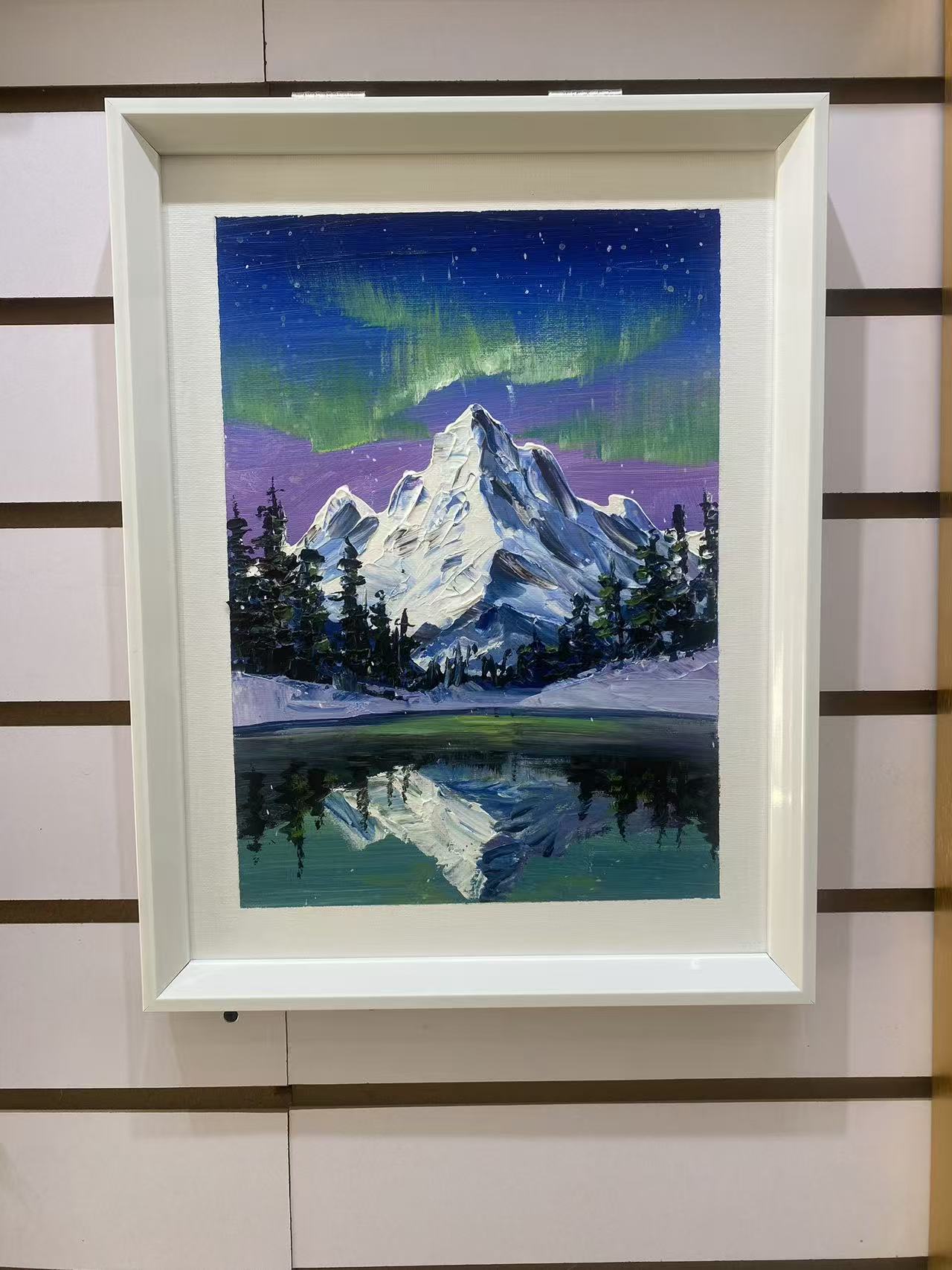 Aurora over Snowy Peaks