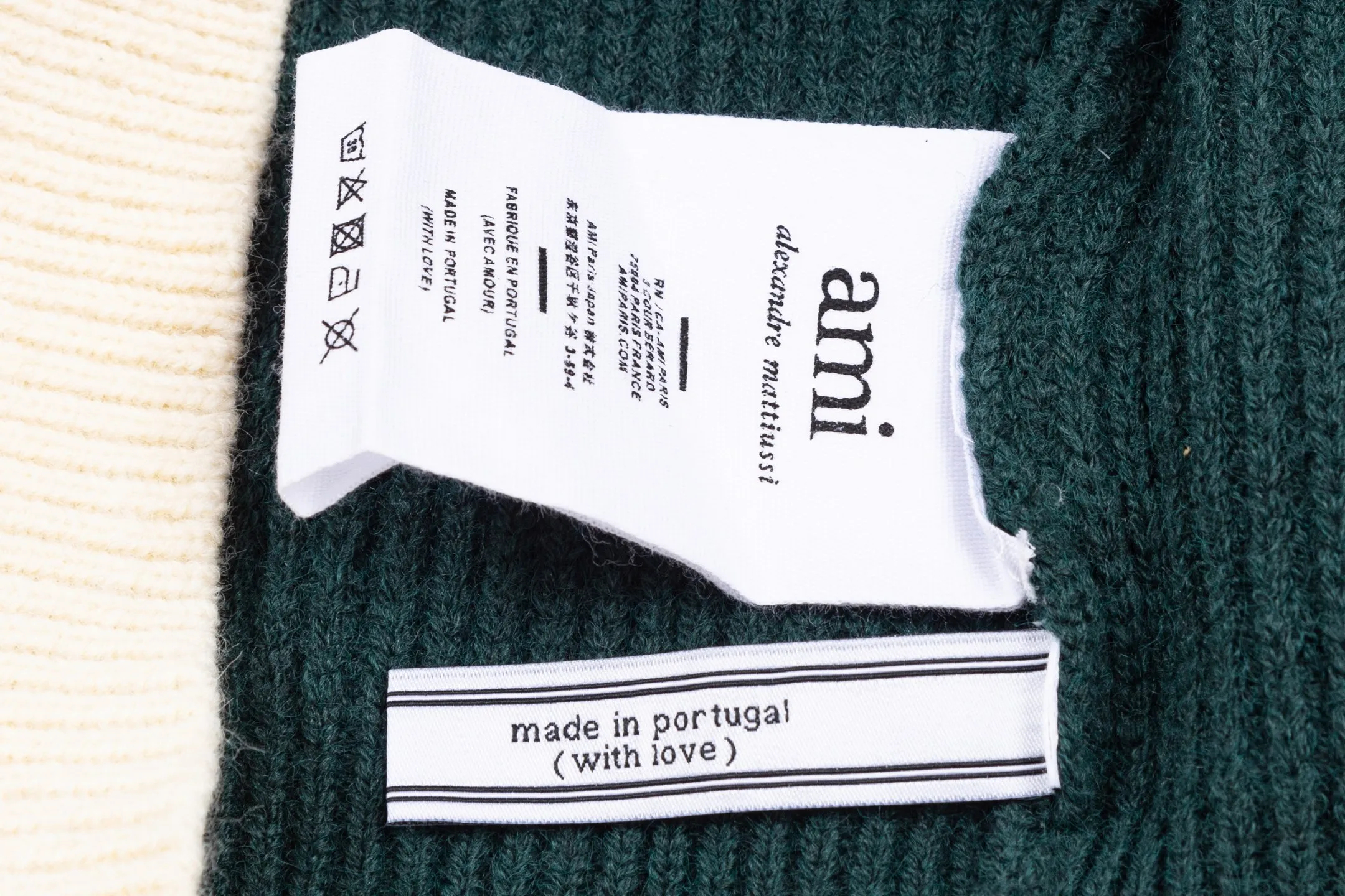 AMI PARIS（アミ パリス） オーバーサイズ ウール カーディガン 男女兼用ロゴニット