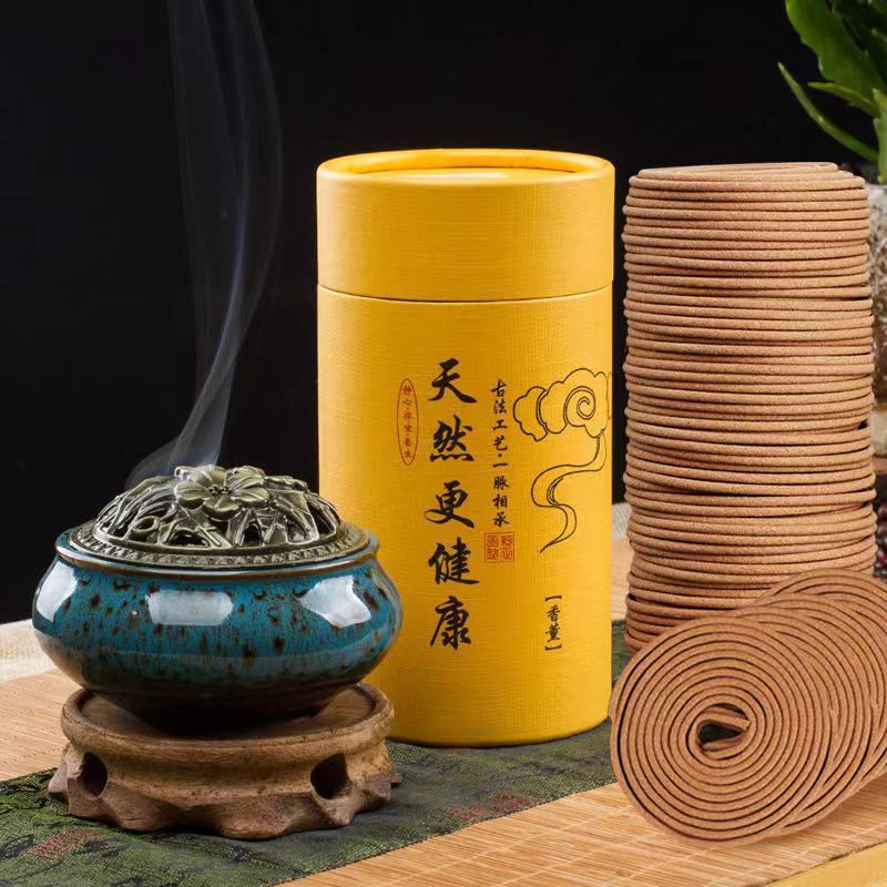 Natural sandalwood incense coils come with an incense burner.