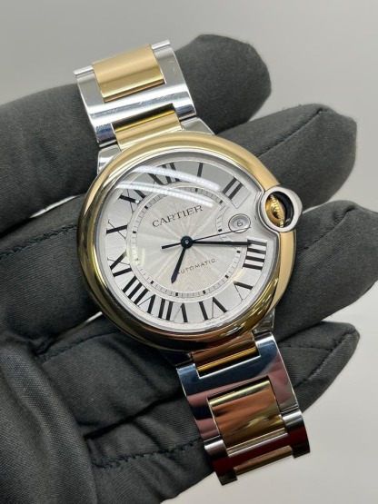 カルティエ バロン ブルー 42mm  Silver Guilloche Dial Stainless Steel and 18k Yellow Gold Bracelet W2BB0039