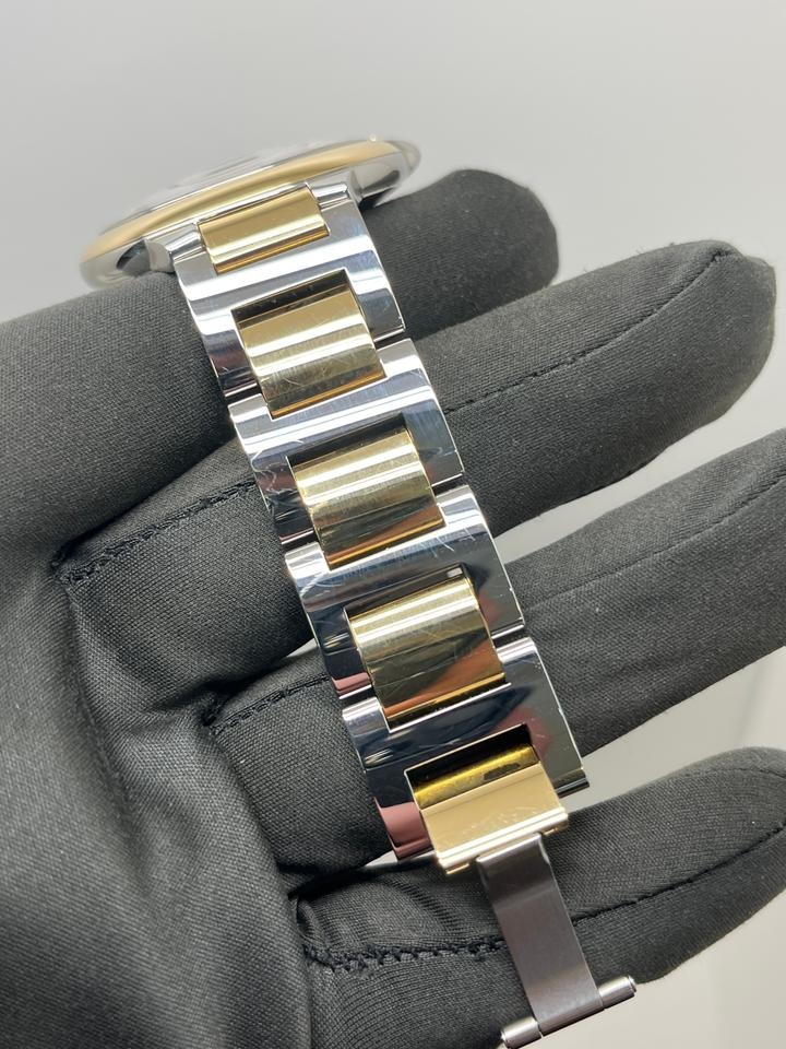 カルティエ バロン ブルー 42mm  Silver Guilloche Dial Stainless Steel and 18k Yellow Gold Bracelet W2BB0039