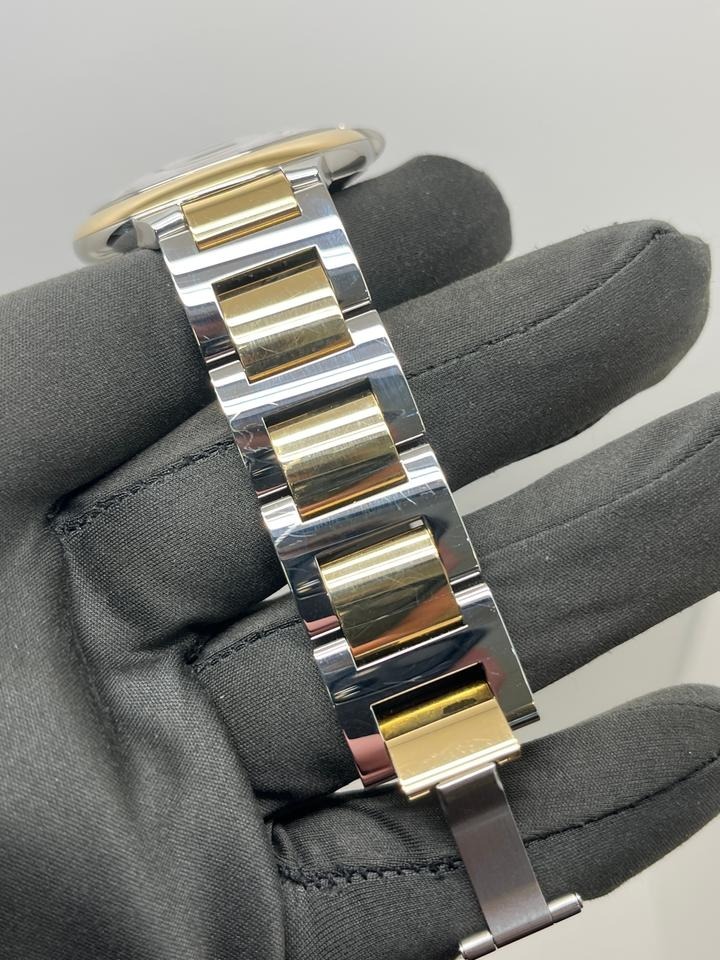 カルティエ バロン ブルー 42mm  Silver Guilloche Dial Stainless Steel and 18k Yellow Gold Bracelet W2BB0039