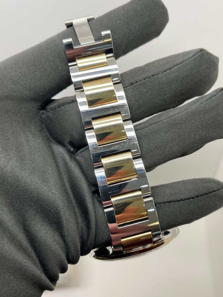 カルティエ バロン ブルー 42mm  Silver Guilloche Dial Stainless Steel and 18k Yellow Gold Bracelet W2BB0039