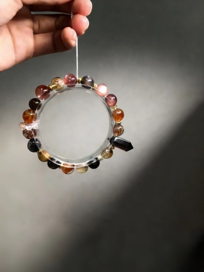 Mysterious Radiance Attracts Wealth · Black-Gold Energy Career Crystal Bracelet, Golden Tiger's Eye & Black Super Seven Luck-Boosting Bracelet