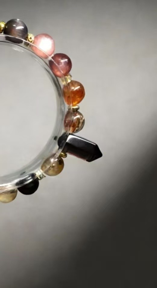 Mysterious Radiance Attracts Wealth · Black-Gold Energy Career Crystal Bracelet, Golden Tiger's Eye & Black Super Seven Luck-Boosting Bracelet