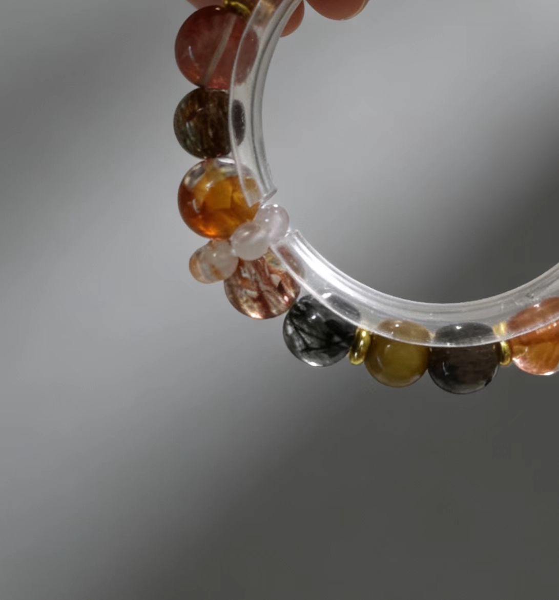 Mysterious Radiance Attracts Wealth · Black-Gold Energy Career Crystal Bracelet, Golden Tiger's Eye & Black Super Seven Luck-Boosting Bracelet