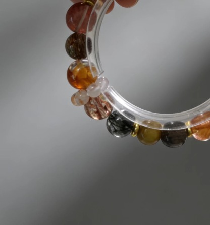 Mysterious Radiance Attracts Wealth · Black-Gold Energy Career Crystal Bracelet, Golden Tiger's Eye & Black Super Seven Luck-Boosting Bracelet