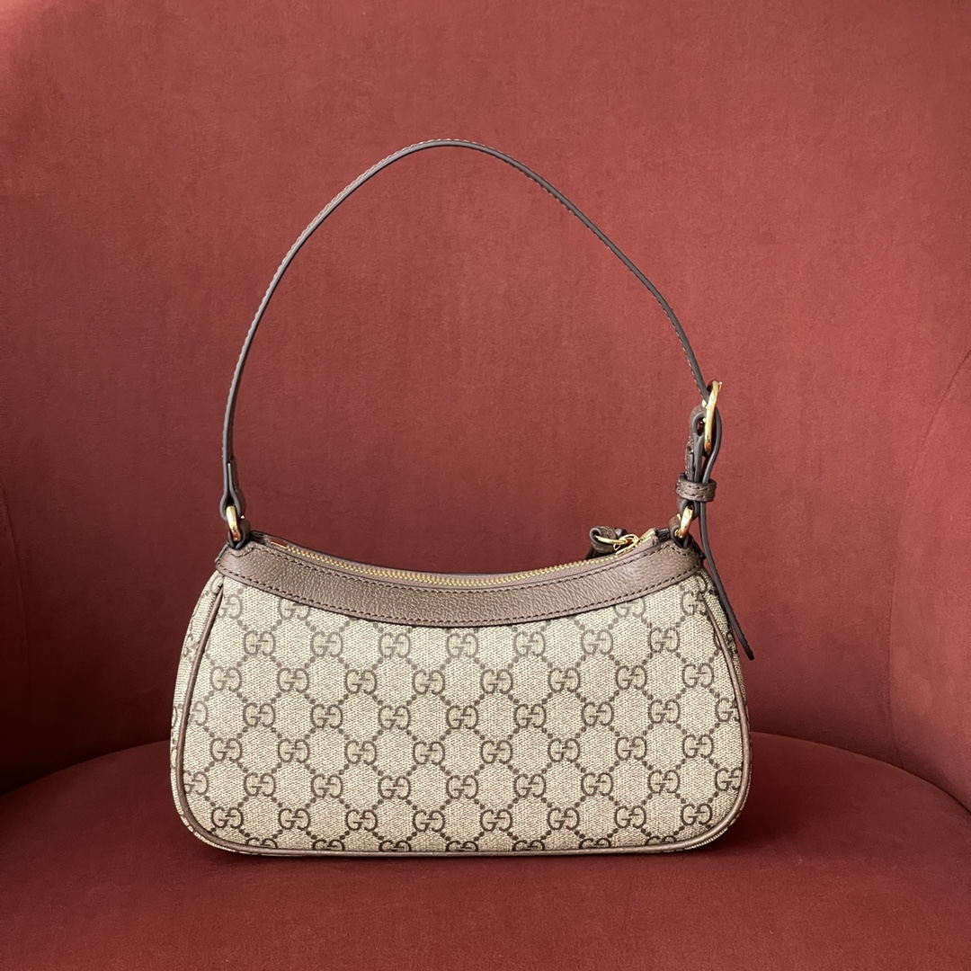 GG新款腋下包型号：G735145 原厂皮 尺寸25*15*6.5 首字母缩写的经典交织字母元素继续为新设计注入品牌标识魅力。这款Ophidia系列小号手袋采用历史悠久的GG Supreme帆布材质，