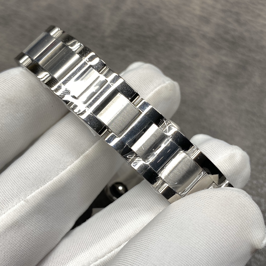 Cartier Ballon Bleu Collection! Model WE9003Z3, ladies' watch with a 33mm case diameter. The pink Ballon Bleu has always been a classic, and this version features a steel bracelet with diamond accents.